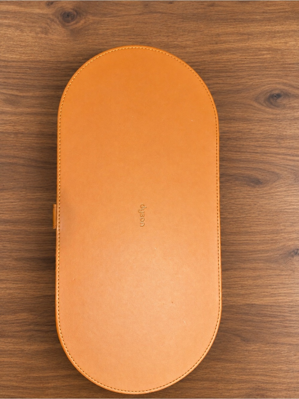 Dyson Orange Oval Leather Electronics Case